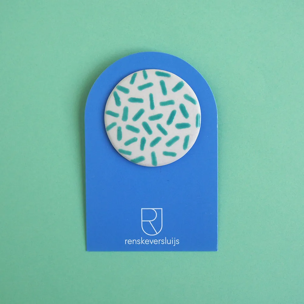 Porcelain brooch Tondo
